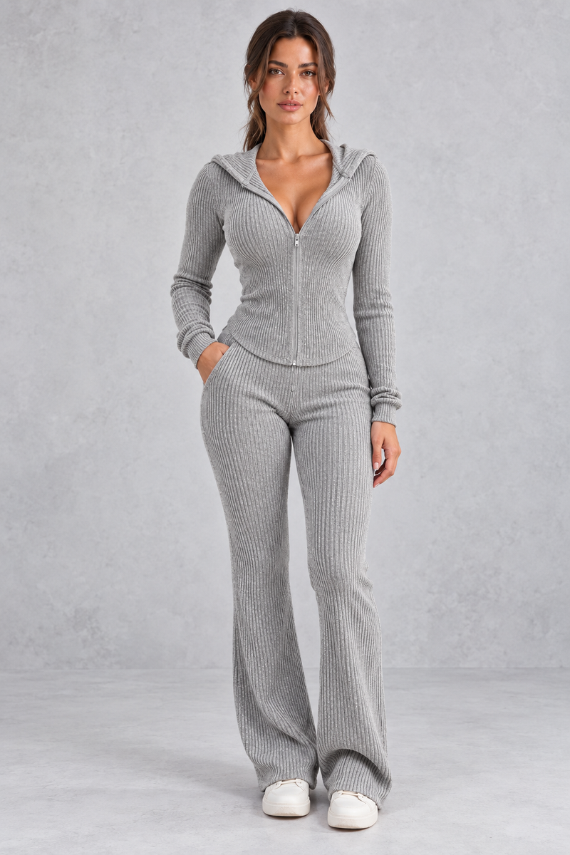 Women’s hooded ribbed knit co-ord set with a fitted zip-up top, long sleeves and matching flared trousers.