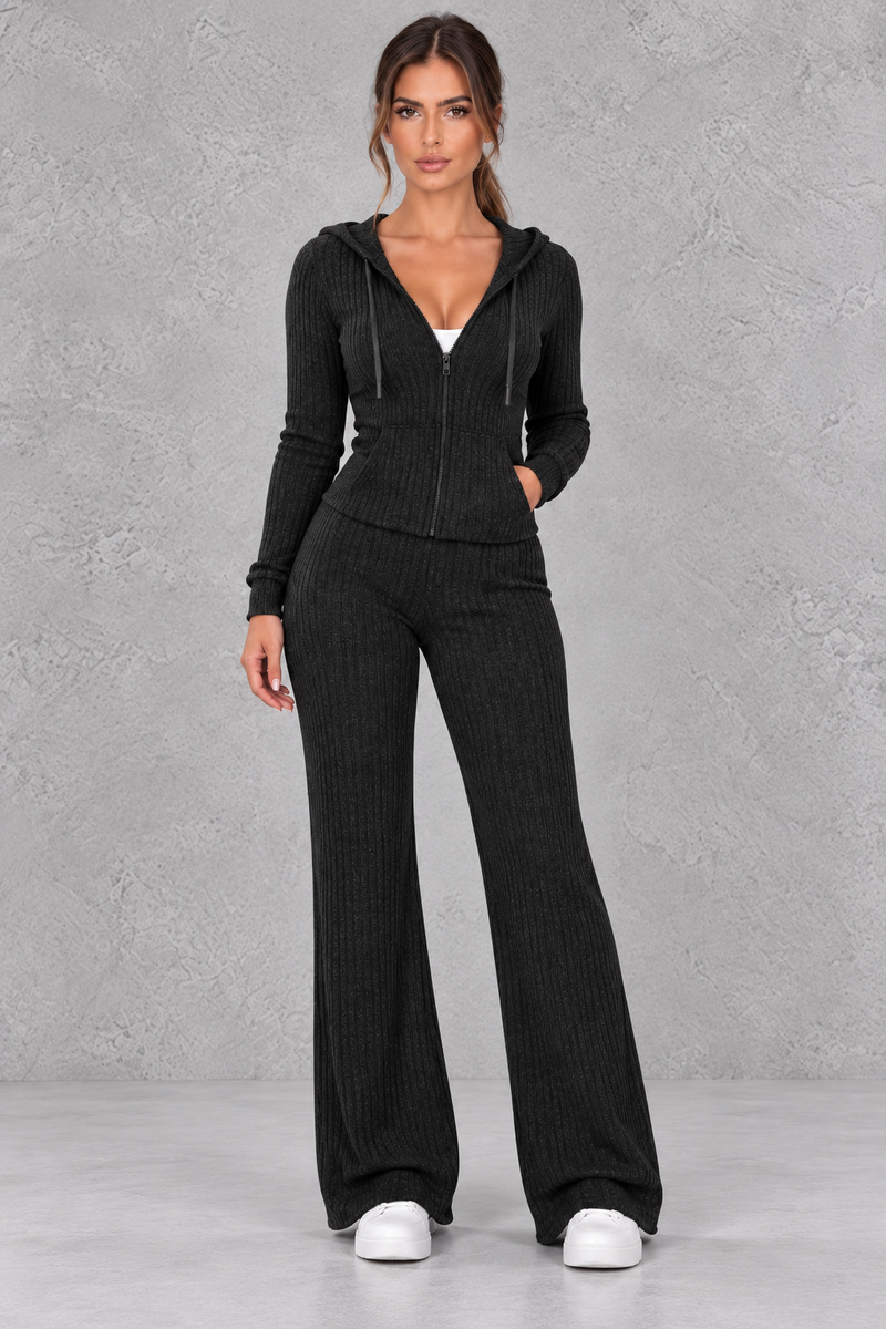 Women’s ribbed knit two-piece co-ord set with a fitted hooded zip-up top, adjustable drawstrings and matching wide leg trousers.