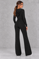 Women’s ribbed knit two-piece co-ord set with a fitted hooded zip-up top, adjustable drawstrings and matching wide leg trousers.