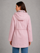 Women’s hooded water-resistant parka with an adjustable drawstring waist, longline fit, storm flap and practical front pockets.