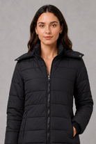 Women’s lightweight insulated hooded coat with padded design, full zip fastening and streamlined fit for autumn and winter.