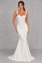 Women’s ivory lace bridal corset with lightly padded underwired cups, adjustable straps, internal boning and a romantic lace-up back.