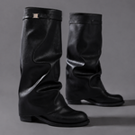 Women’s knee-high slouch boots with pointed toe, low block heel and metal cuff detail.