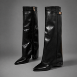 Women’s knee-high slouch boots with pointed toe, low block heel and metal cuff detail.
