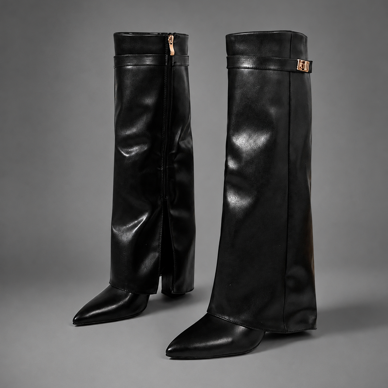 Women’s knee-high slouch boots with pointed toe, low block heel and metal cuff detail.