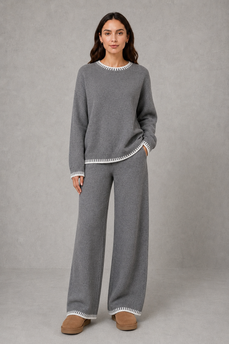 Women’s knitted co-ord set featuring a relaxed crew-neck jumper with contrast trim and matching wide leg knitted trousers.