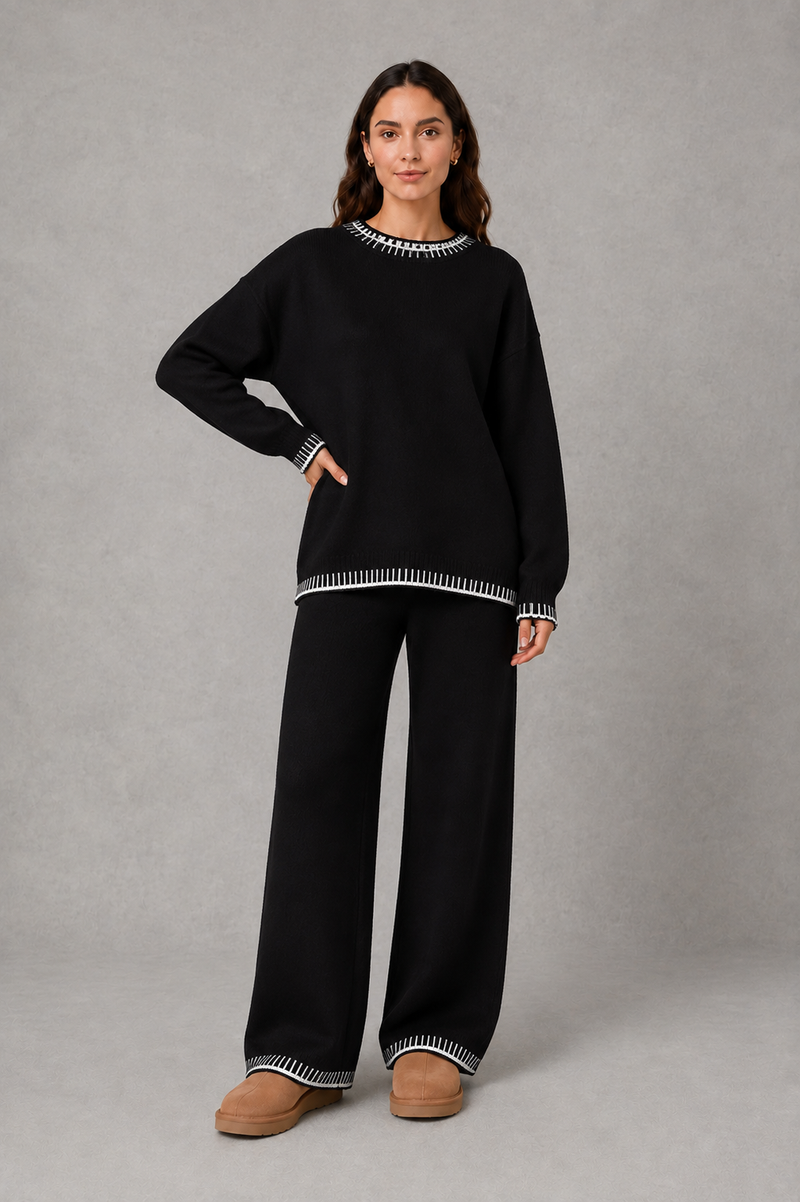 Women’s knitted co-ord set featuring a relaxed crew-neck jumper with contrast trim and matching wide leg knitted trousers.