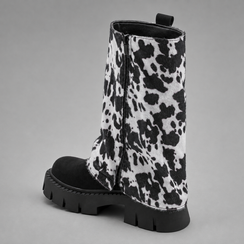 Women’s brown leather knee-high boots with double buckle details, long external zip and chunky sturdy sole.