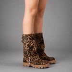 Women’s brown leather knee-high boots with double buckle details, long external zip and chunky sturdy sole.
