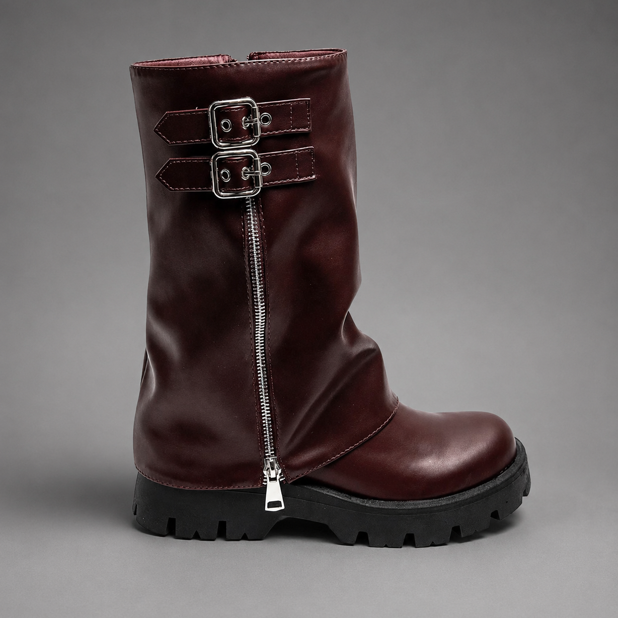 Women’s brown leather knee-high boots with double buckle details, long external zip and chunky sturdy sole.