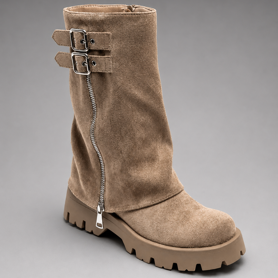 Women’s brown leather knee-high boots with double buckle details, long external zip and chunky sturdy sole.
