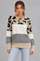 Women’s leopard print knit jumper with neutral colour-block panels, a wide crew neckline, dropped shoulders and relaxed silhouette.