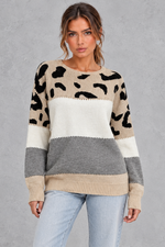 Women’s leopard print knit jumper with neutral colour-block panels, a wide crew neckline, dropped shoulders and relaxed silhouette.