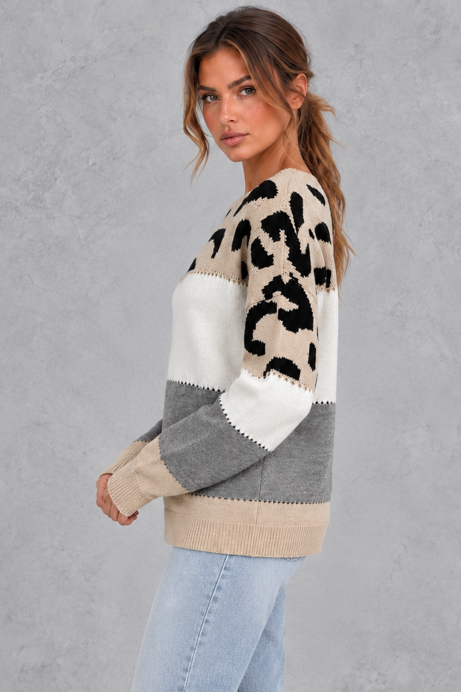 Women’s leopard print knit jumper with neutral colour-block panels, a wide crew neckline, dropped shoulders and relaxed silhouette.