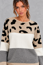Women’s leopard print knit jumper with neutral colour-block panels, a wide crew neckline, dropped shoulders and relaxed silhouette.