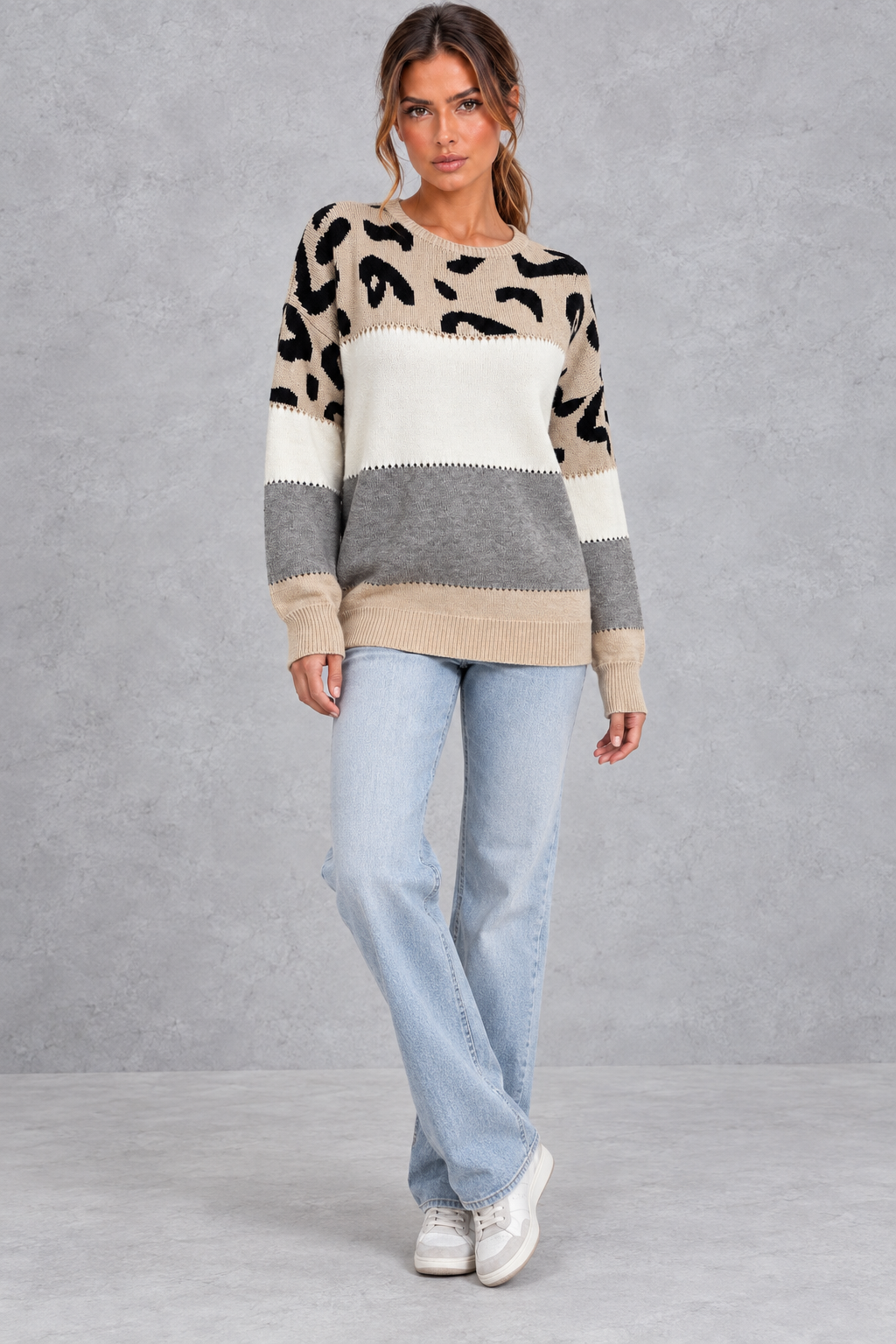 Women’s leopard print knit jumper with neutral colour-block panels, a wide crew neckline, dropped shoulders and relaxed silhouette.