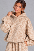Women's cream leopard print hoodie – close-up of hood, print and contrast piping
