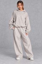 Women's light grey leopard print hoodie and wide leg jogger set – front view