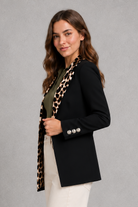 Women's elegant leopard print midi cardigan with long sleeves, an open-front design and a soft stretch knit, ideal for smart casual and everyday layering.