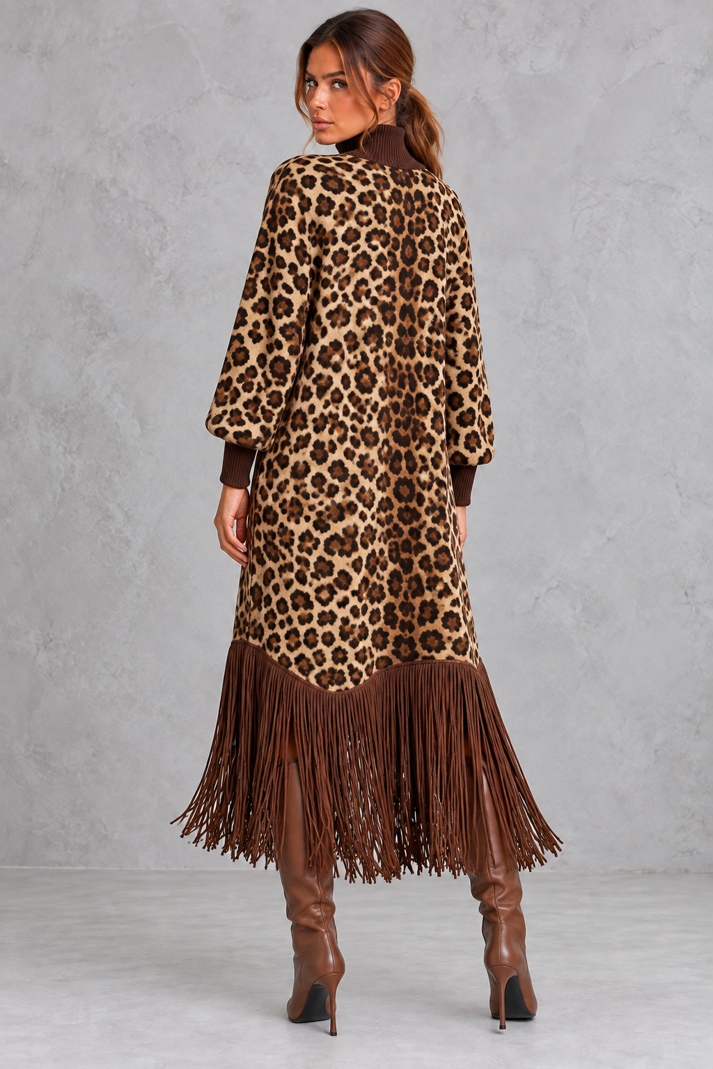 Women’s leopard print boho maxi dress with a high neckline, long sleeves, relaxed A-line silhouette, practical pockets and tassel-trimmed hem.