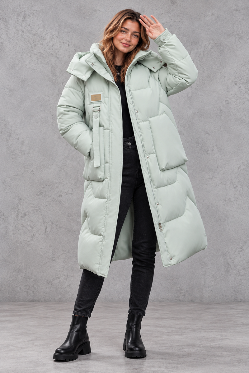 Women's long hooded puffer coat in Mint Green – front view