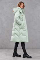 Women's long hooded puffer coat in Mint Green – side view