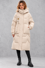 Women's long hooded puffer coat in Beige – front view