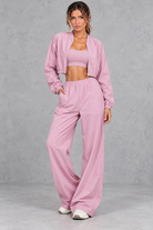 Women's lilac cropped zip-up jacket and wide leg trouser fitness set – front view