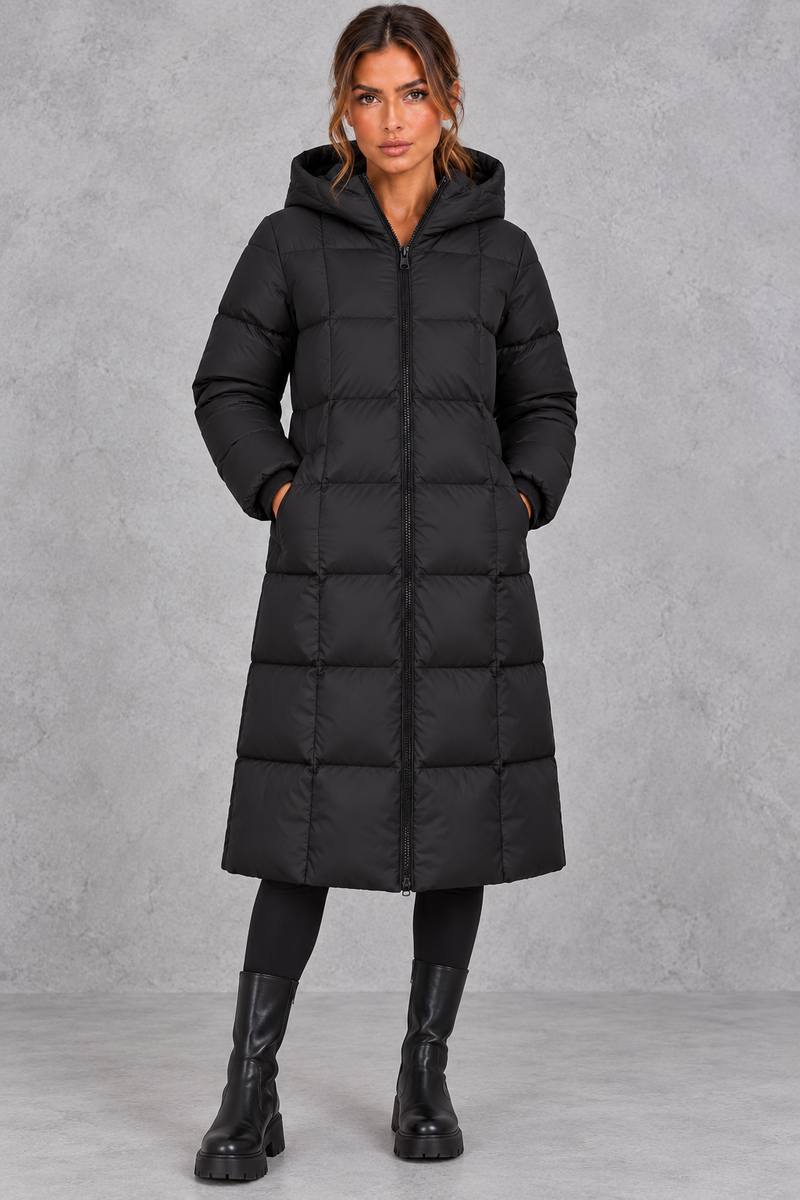 Women’s longline hooded puffer winter coat with streamlined quilting, a high neckline, full zip front and practical side pockets.
