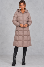 Women’s longline hooded puffer winter coat with streamlined quilting, a high neckline, full zip front and practical side pockets.