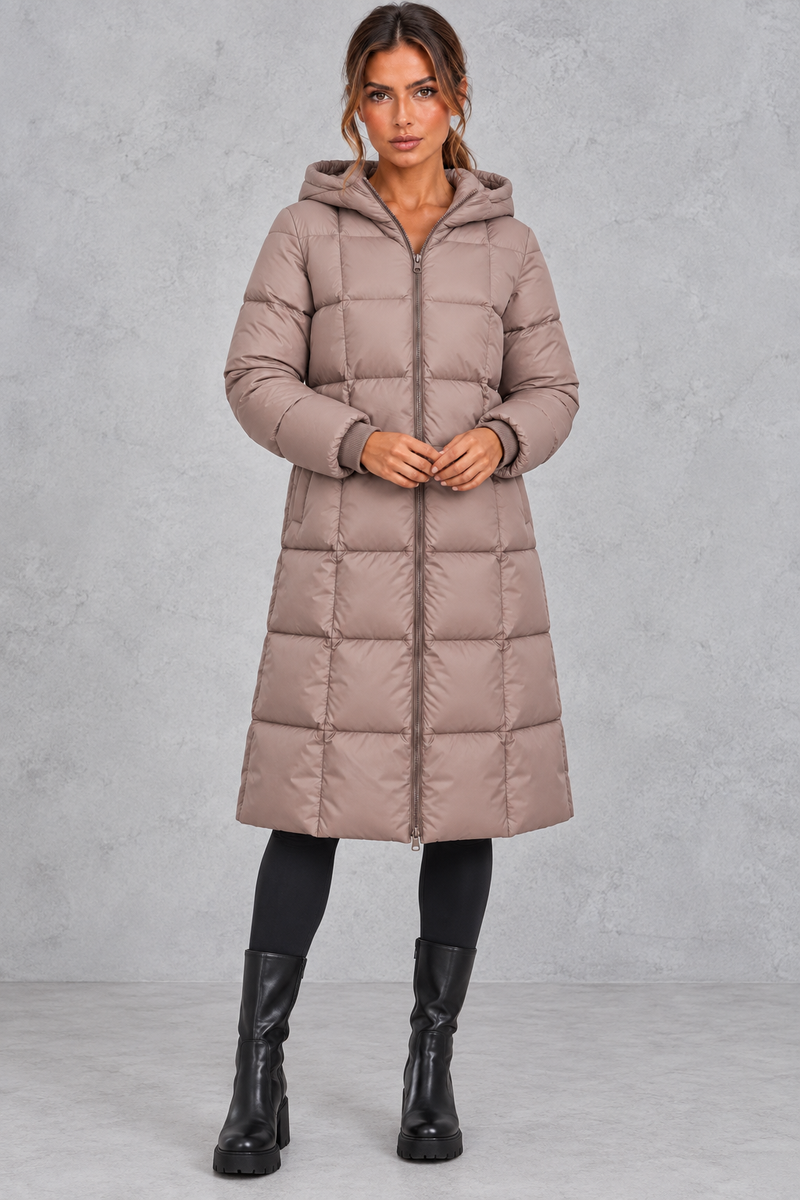 Women’s longline hooded puffer winter coat with streamlined quilting, a high neckline, full zip front and practical side pockets.
