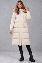 Women's longline puffer parka in Ivory – front view