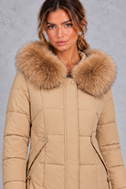 Women's longline quilted puffer coat in Camel – close-up