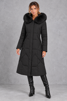 Women's longline quilted puffer coat in Black – front view