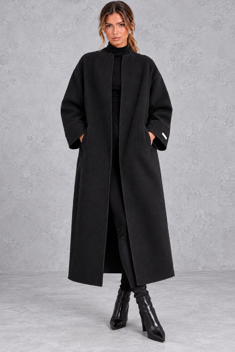 Women's longline wool-blend coat in Black – front view