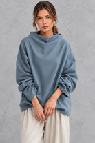 Women’s loose roll neck long sleeve jumper with a solid-colour finish and relaxed everyday silhouette – image 1