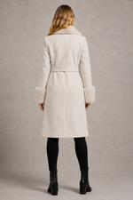 Women's blue luxury longline belted coat crafted from a wool and cashmere blend, featuring removable fox fur trim on the collar and cuffs, tailored silhouette, waist belt and full-length winter design.