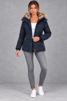 Women's Mid-Thigh Quilted Puffer Coat in Navy Blue – full-length view