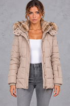 Women's Mid-Thigh Quilted Puffer Coat in Beige – front view