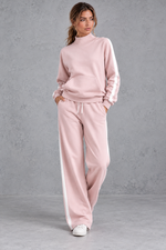 Women's pink mock neck wide leg tracksuit set with side stripes – front view