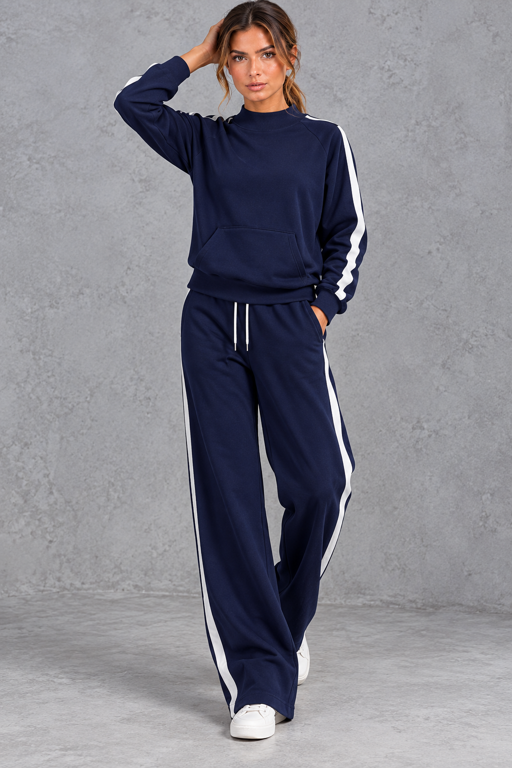Women's navy blue mock neck wide leg tracksuit set with side stripes – front view