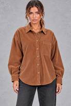 Women's oversized corduroy shirt in Rust – front view
