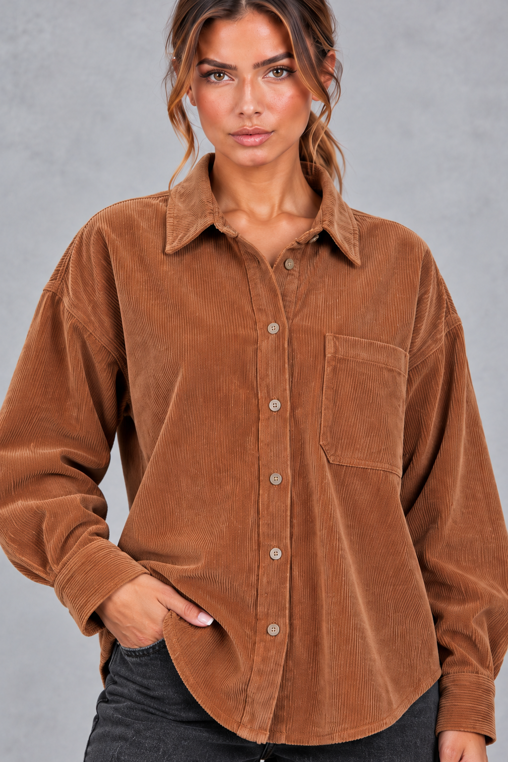 Women's oversized corduroy shirt in Rust – front close-up of collar and pocket
