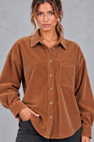 Women's oversized corduroy shirt in Rust – front close-up of collar and pocket