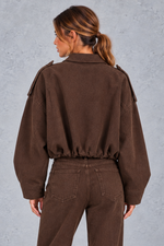 Women's brown oversized cropped bomber jacket – back view showing drawstring hem