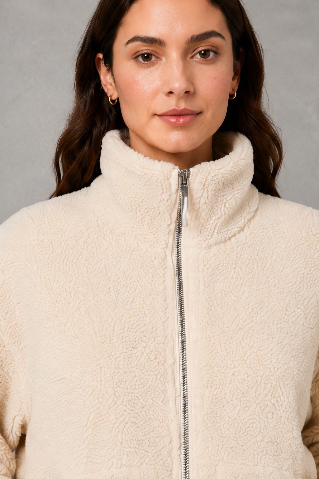 Women’s oversized teddy fleece jacket with a soft plush texture, full zip fastening, relaxed fit and practical front pockets.