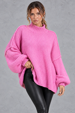 Women's pink oversized high neck chunky knit jumper with balloon sleeves – front view