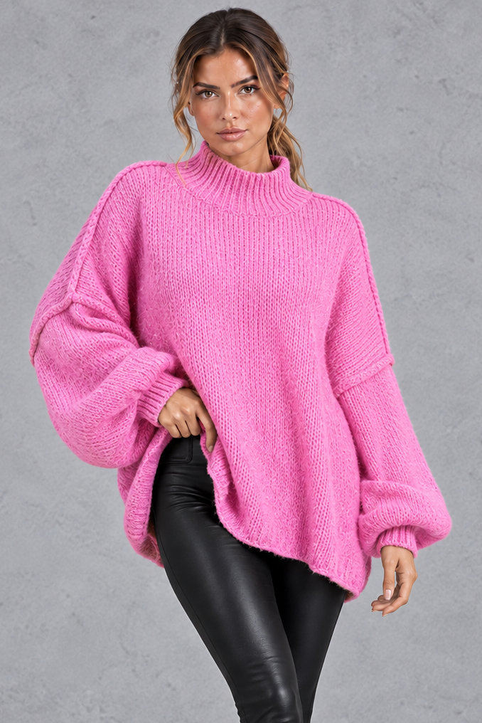 Women's pink oversized high neck chunky knit jumper with balloon sleeves – front view