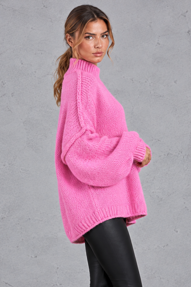 Women's pink oversized chunky knit balloon sleeve jumper – side view