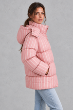 Women’s pink and white striped oversized hooded puffer jacket with horizontal quilting, a high stand collar and voluminous padded silhouette.
